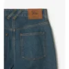 Jeans a vita alta e zampa d’elefante