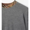 Maglione in lana con bordi a quadri