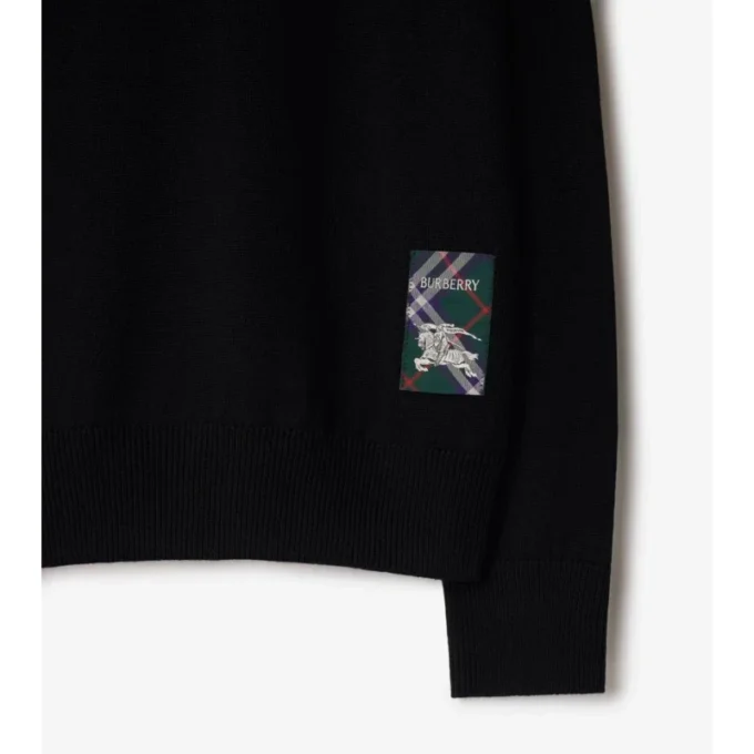 Maglione in lana con etichetta a quadri
