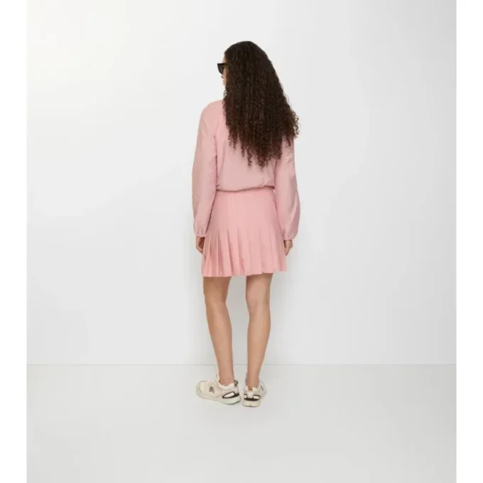 Mini gonna in nylon elasticizzato a pieghe