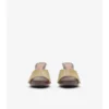 Mules in pelle con motivo a quadri