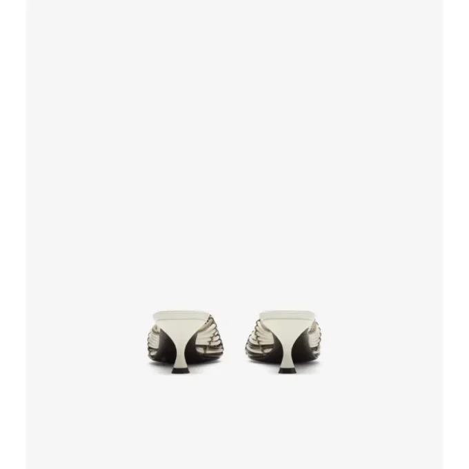 Mules in pelle intrecciata a quadri
