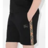 Pantaloncini in cotone con bordi a quadri