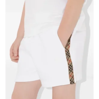 Pantaloncini in cotone con bordi a quadri