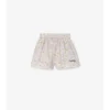 Pantaloncini in cotone con margherite