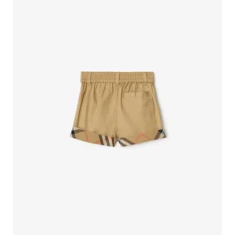 Pantaloncini in cotone con risvolto a quadri