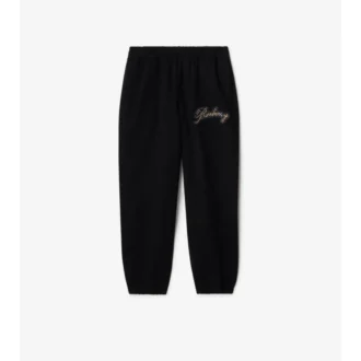 Pantaloni da jogging in cotone con logo in corsivo a quadri