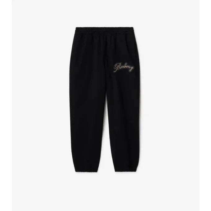 Pantaloni da jogging in cotone con logo in corsivo a quadri