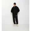 Pantaloni da jogging in cotone con logo in corsivo a quadri