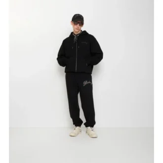 Pantaloni da jogging in cotone con logo in corsivo a quadri