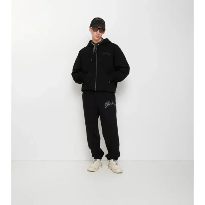 Pantaloni da jogging in cotone con logo in corsivo a quadri