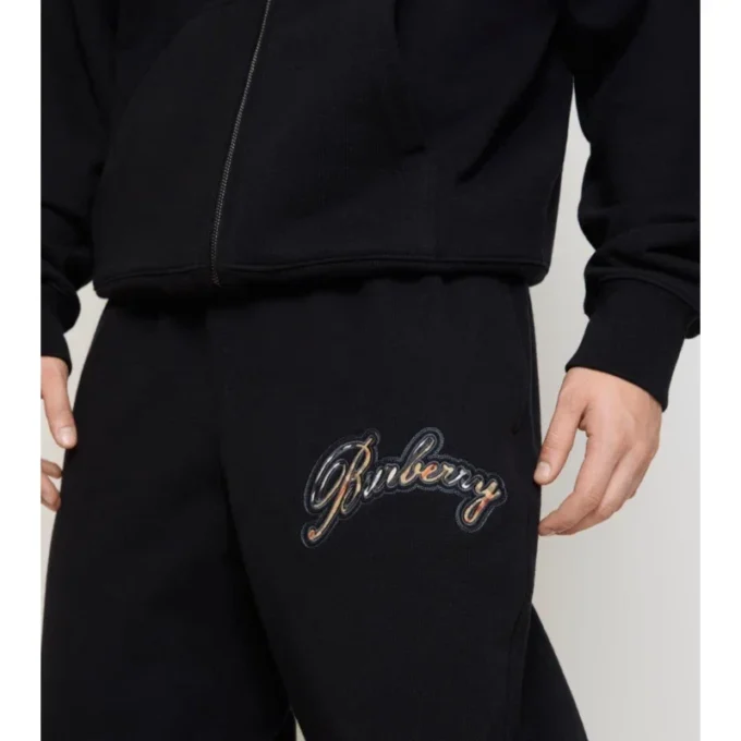 Pantaloni da jogging in cotone con logo in corsivo a quadri