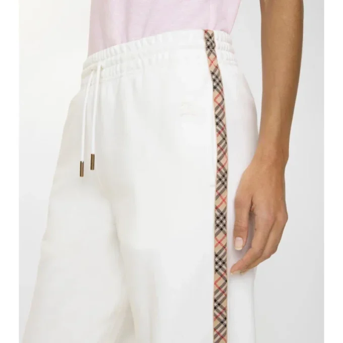 Pantaloni da tuta in cotone con bordi a quadri