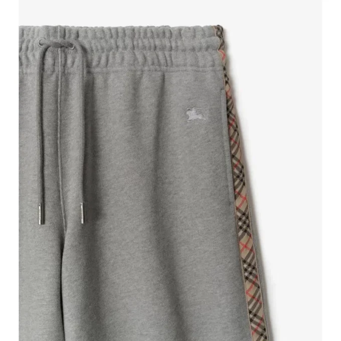 Pantaloni da tuta in cotone con bordi a quadri