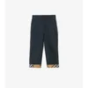 Pantaloni in cotone con risvolto a quadri