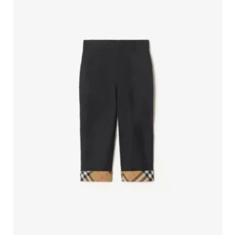 Pantaloni in cotone con risvolto a quadri