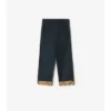 Pantaloni in cotone con risvolto a quadri