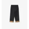 Pantaloni in cotone con risvolto a quadri