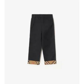 Pantaloni in cotone con risvolto a quadri