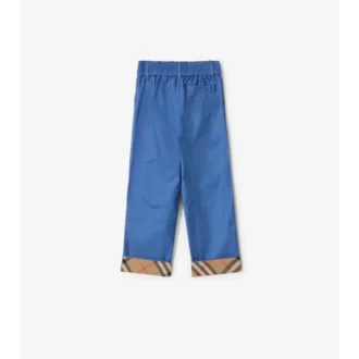 Pantaloni in cotone con risvolto a quadri