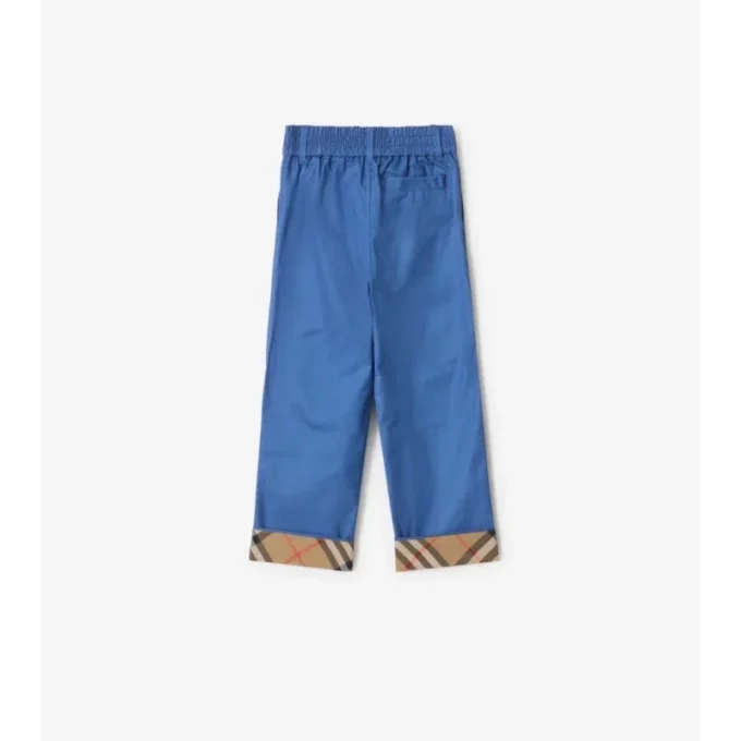 Pantaloni in cotone con risvolto a quadri