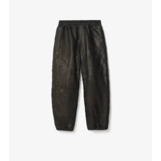 Pantaloni in pelle con logo in corsivo
