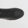 Sneakers in pelle con dettagli a righe
