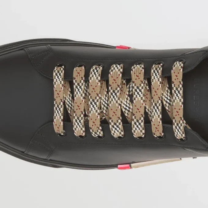 Sneakers in pelle con dettagli a righe