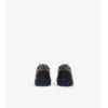 Sneakers in pelle e tessuto a quadri 