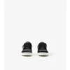 Sneakers in pelle, pelle scamosciata e motivo a quadri