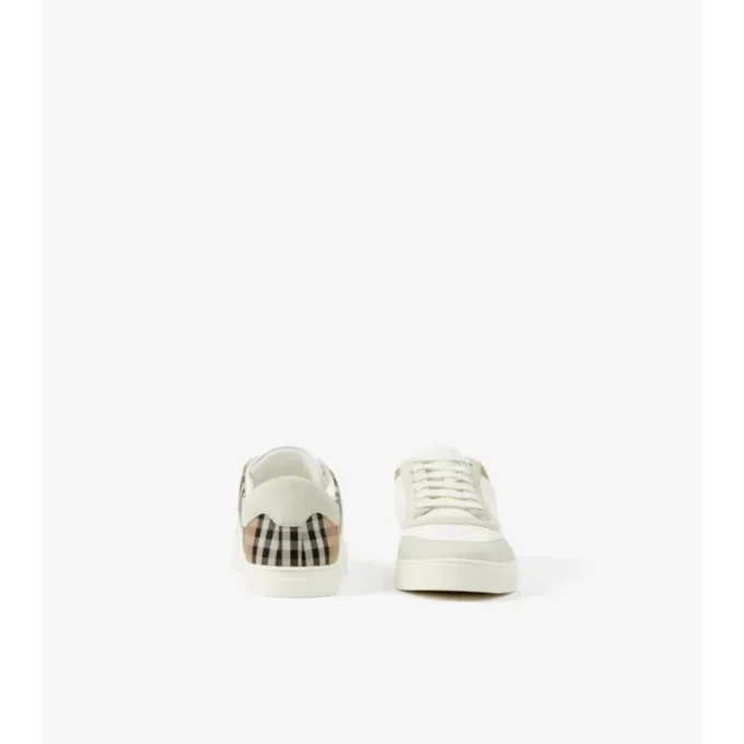 Sneakers in pelle, pelle scamosciata e motivo a quadri
