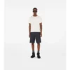 T-shirt in cotone con bordi a quadri
