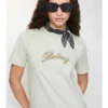T-shirt in cotone con logo in corsivo a quadri