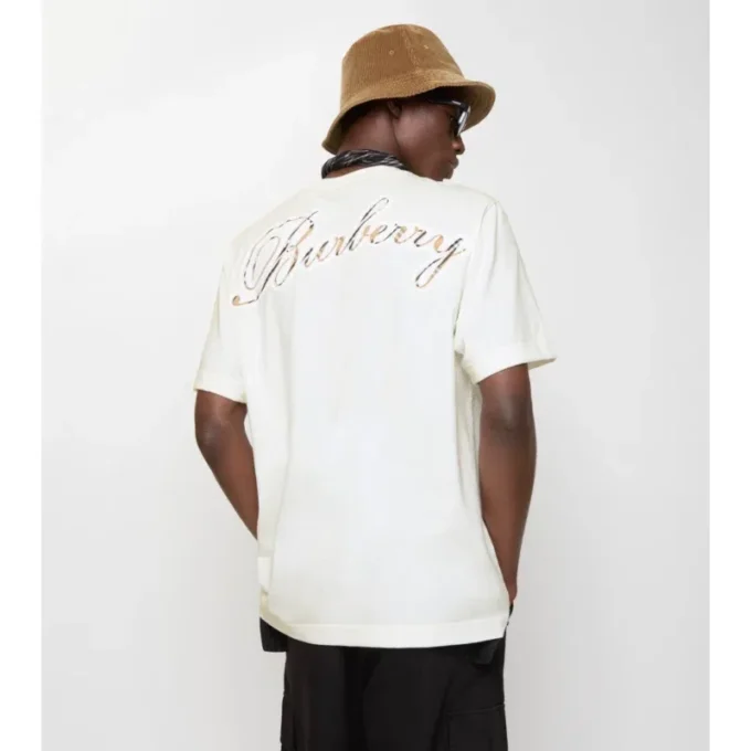 T-shirt in cotone con logo in corsivo a quadri