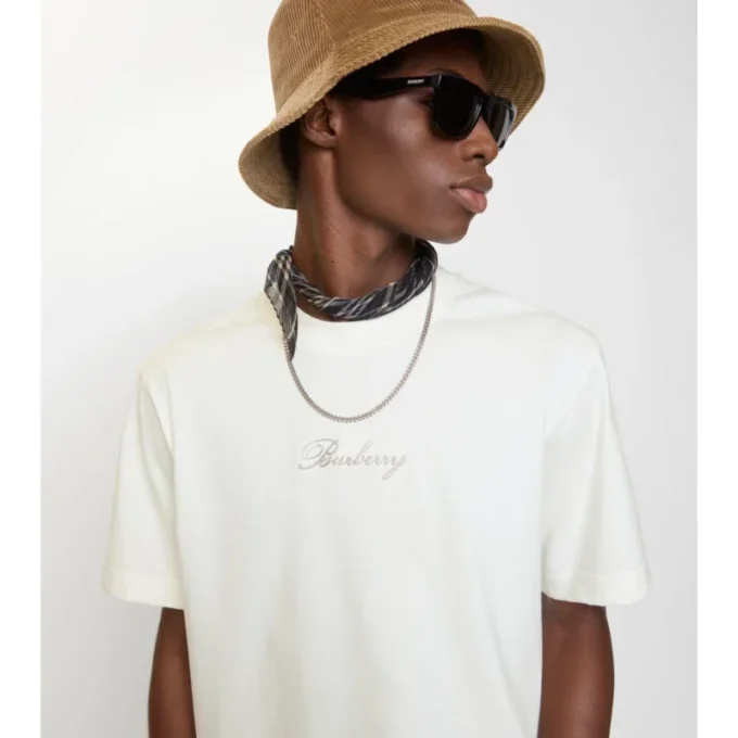 T-shirt in cotone con logo in corsivo a quadri