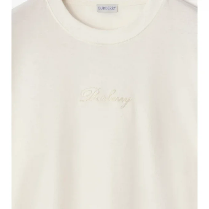T-shirt in cotone con logo in corsivo a quadri