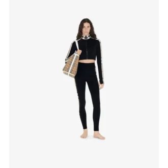Top corto in jersey elasticizzato con zip e bordi a quadri
